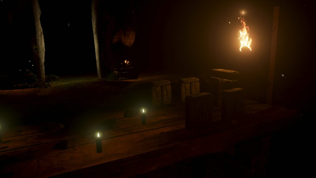 A torch-lit table with bricks on it