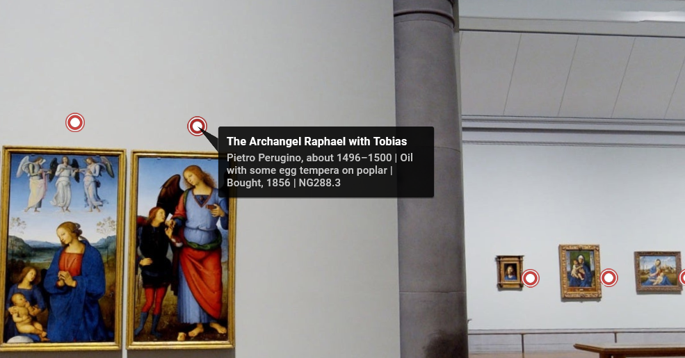 An image of paintings on a museum wall